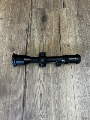 Firearm: Schmidt and Bender 8x56 