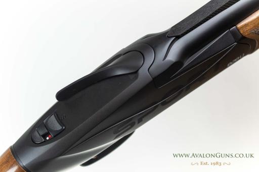 Firearm: Benelli 828 AI Sport